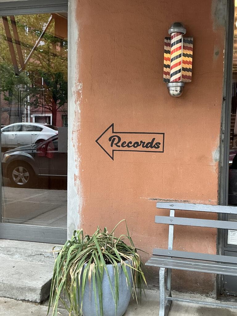 Barber Pole with the word "Records" written underneath