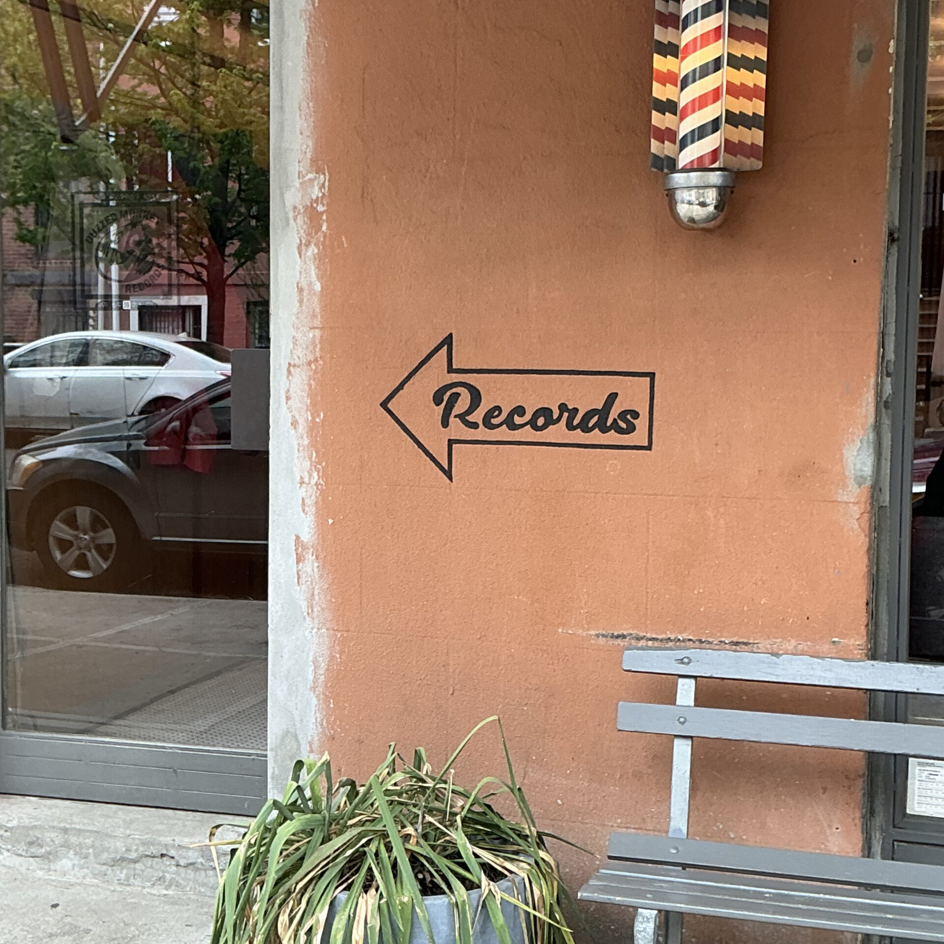 Barber Pole with the word "Records" written underneath