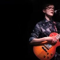 performer with guitar